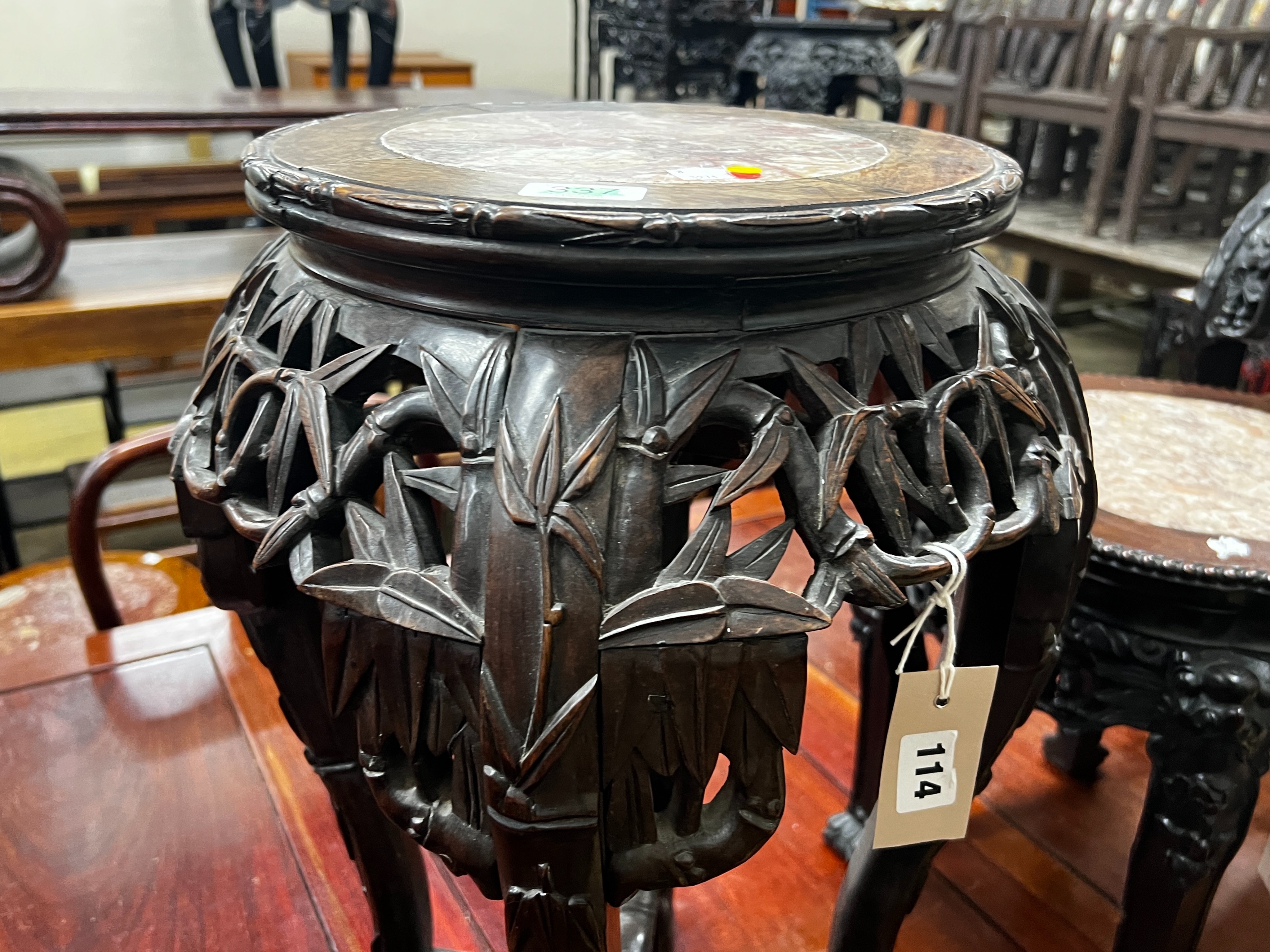 A Chinese circular marble top hongmu vase stand, width 39cm, height 62cm